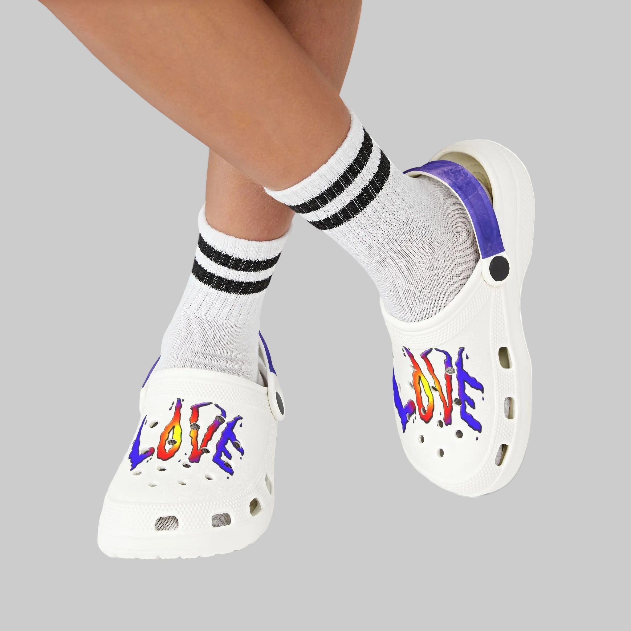 Comfy, durable, flexible, fun, colorful white clog also comes with black interior and footbed
