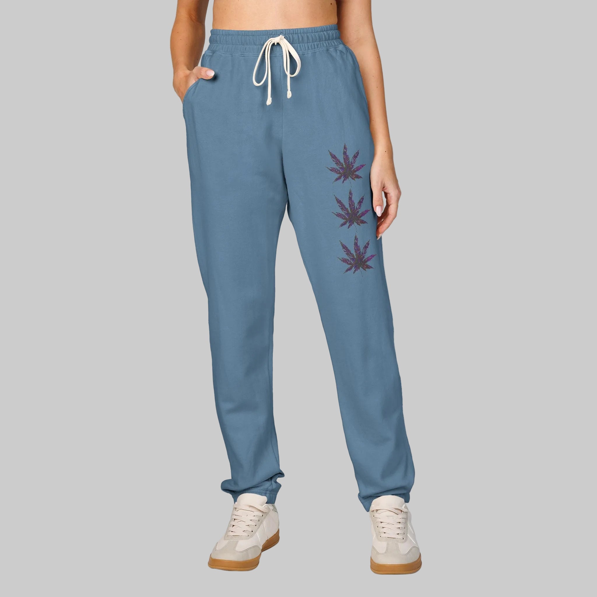Blue Jean sweatpants with a marijuana vibe graphic signifies your vibe 