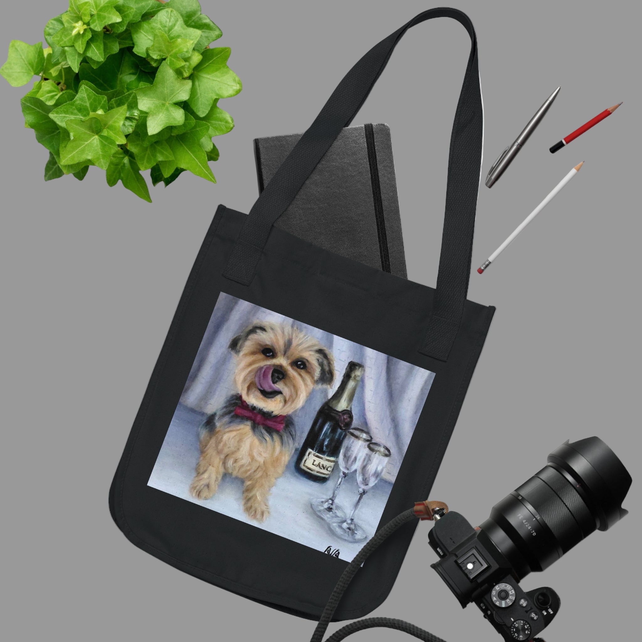 Black organic cotton tote bag with a adorable Yorkie and champagne for dog lovers - great gift idea.