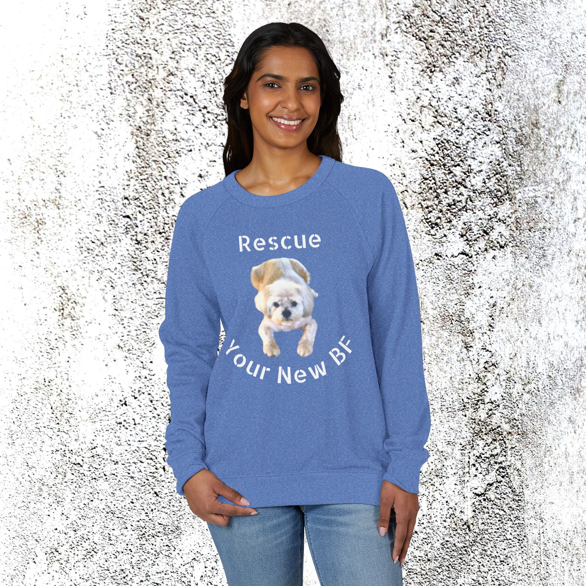 Person wearing a blue shirt with a dog graphic and text 