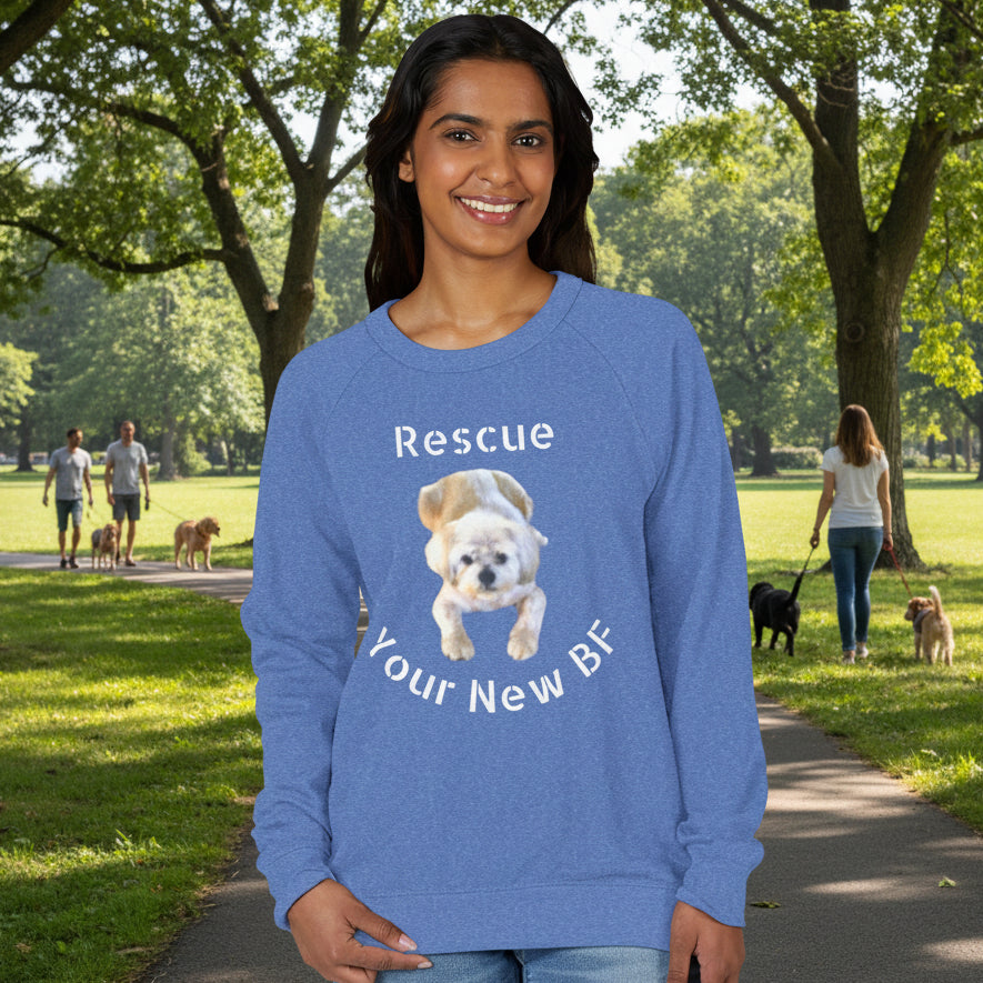 Person wearing a blue shirt with a dog graphic and text 