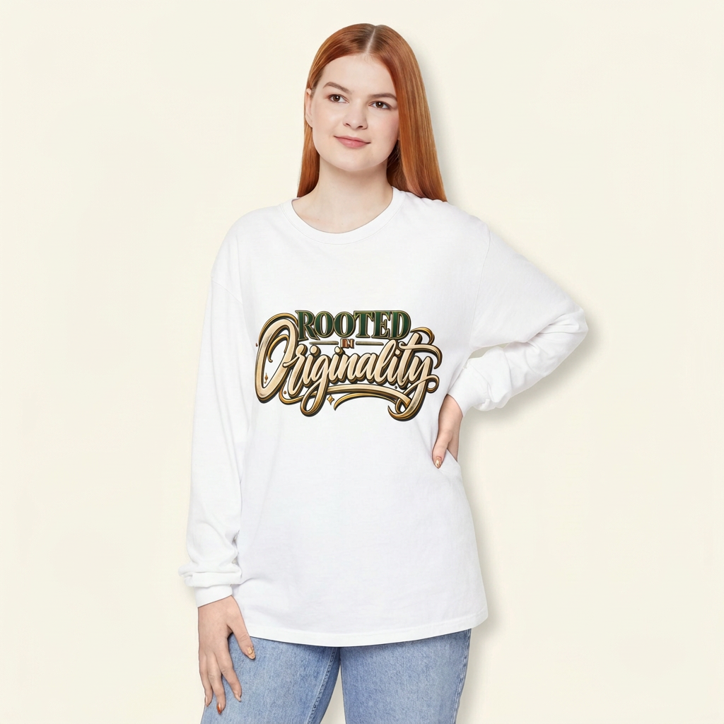 Red-haired woman wearing a white Rooted in Originality long-sleeve tee, hand on hip.
