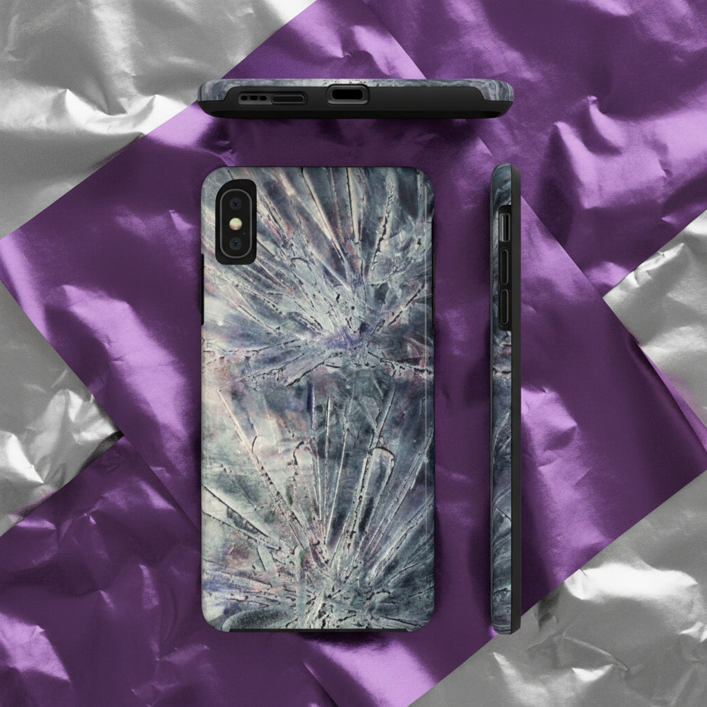 Phone case in abstract bursts of silver crystal design with rubber lining for strong impact and UV protection