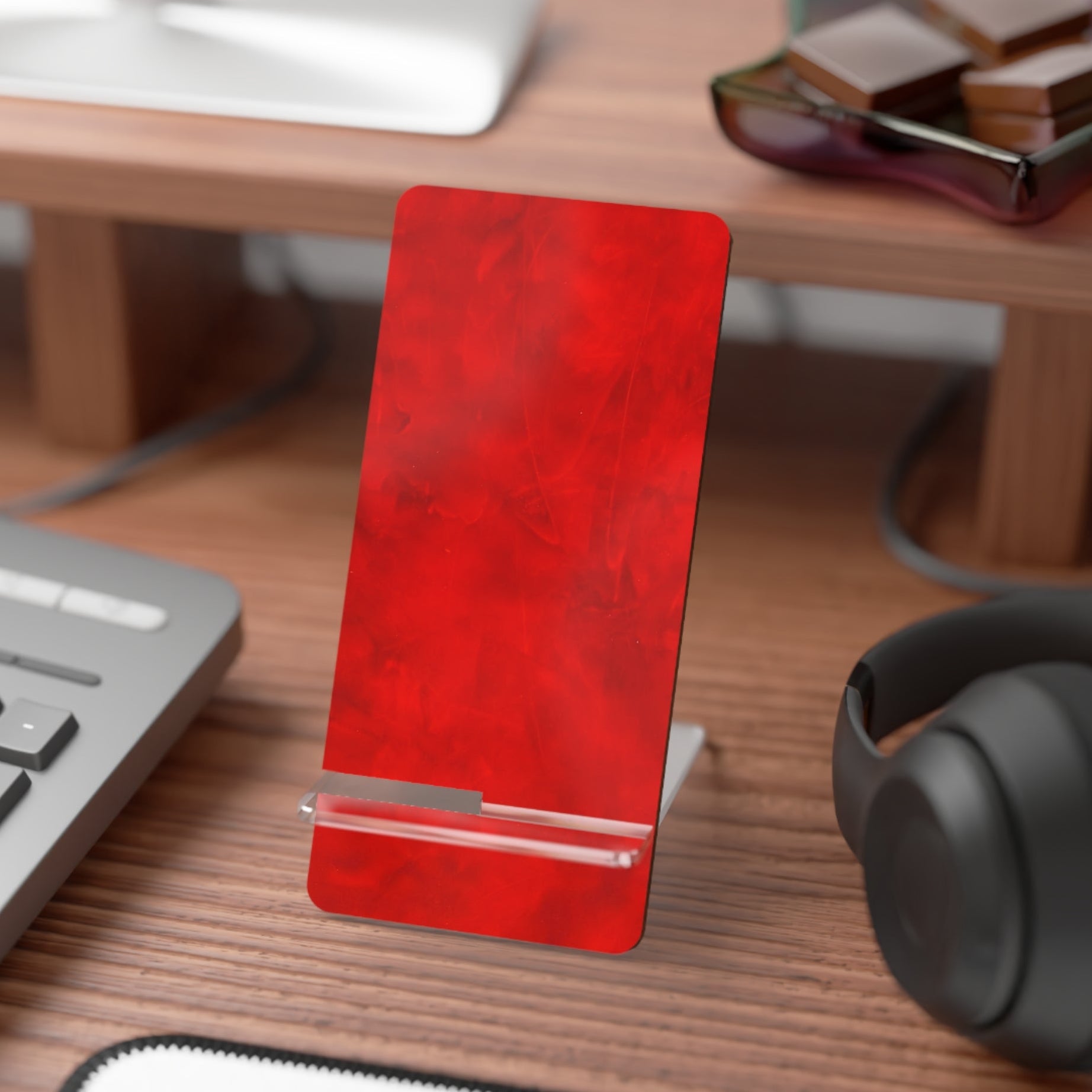 Red leather look phone stand can be moved anywhere